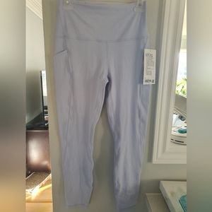 Size 8 Lululemon Purple Align Leggings 25" with pockets